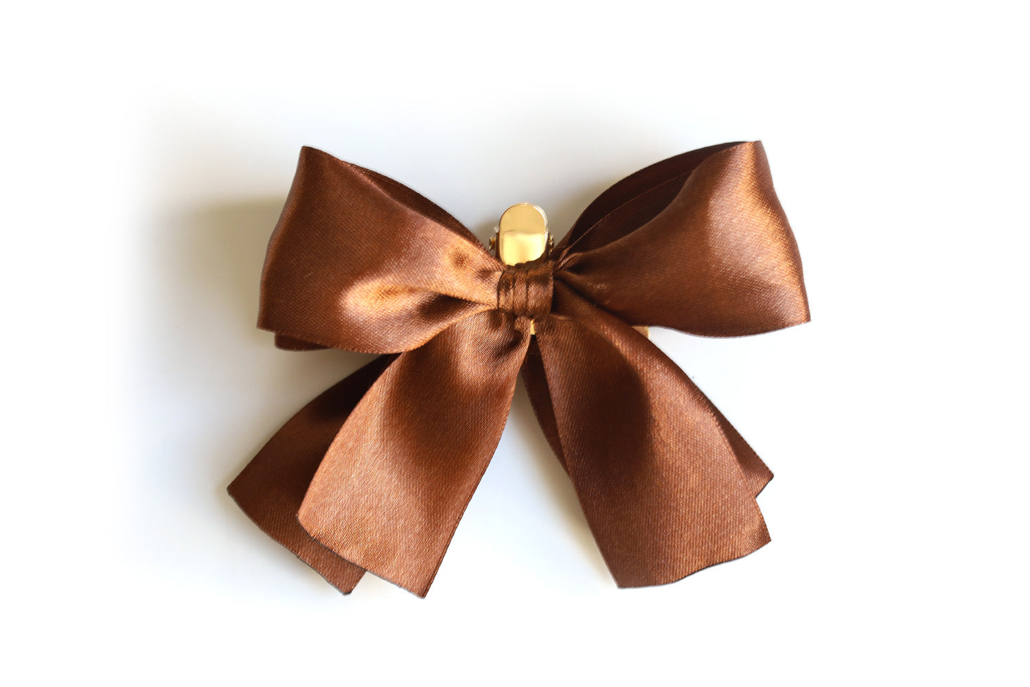 Double bow on gold clip