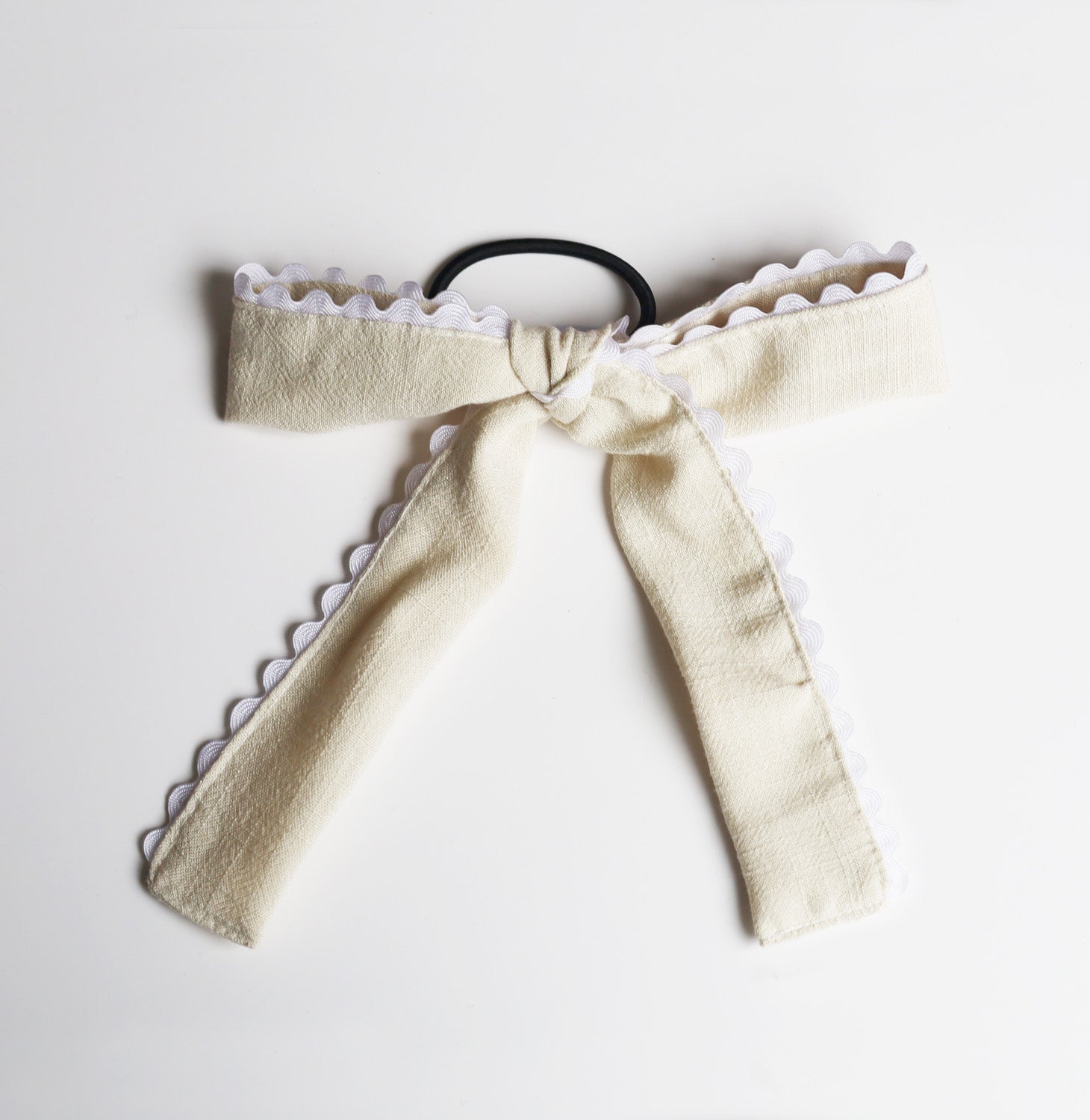 Boucle sur élastique avec bordure