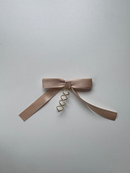 Échantillon - Boucle crème rosée sur spirale