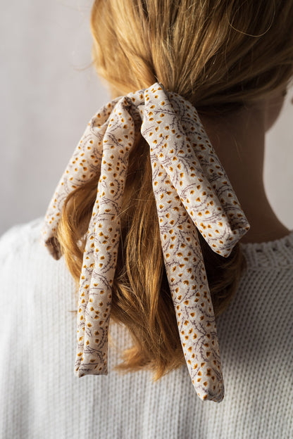 Échantillon - Boucle sur élastique trait floral